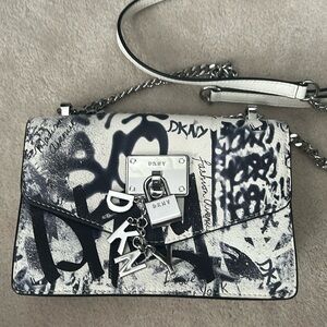 Super fun going out on the town DKNY graffiti crossbody. Never used w/dust bag